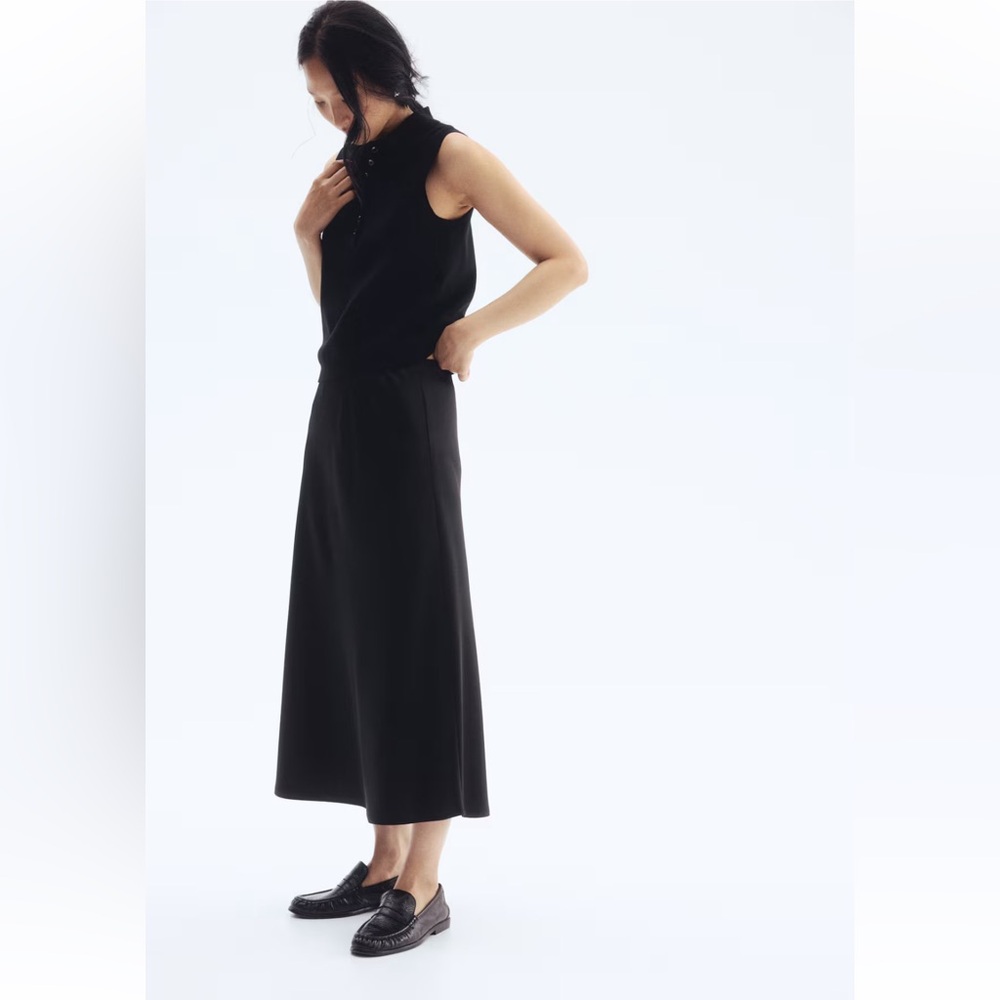 H&M black satin midi skirt calf length high waist flared hem M